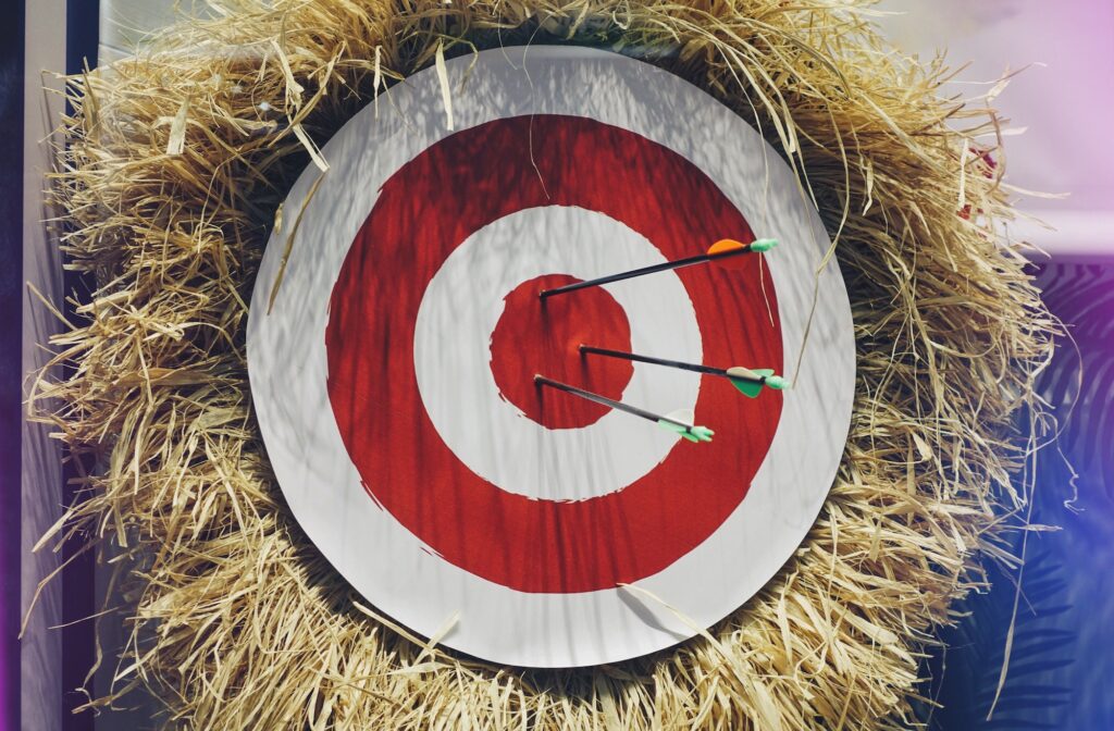 Arrow & the target : archery target with arrows stuck in the middle